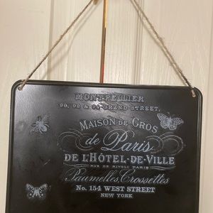 Metal sign with burlap hanger